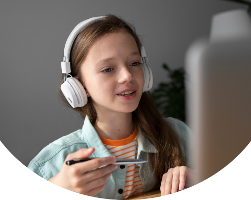 Girl in headphones learning